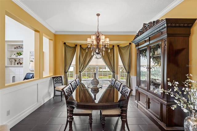 8424 Lake Burden Cir, Windermere, FL 34786 - dining room featuring a chandelier, built in shelves, and ornamental molding