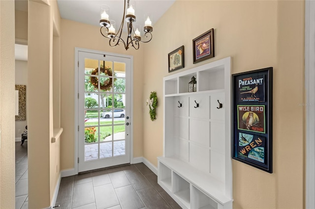 8424 Lake Burden Cir, Windermere, FL 34786 - mudroom featuring a chandelier and tile patterned floors