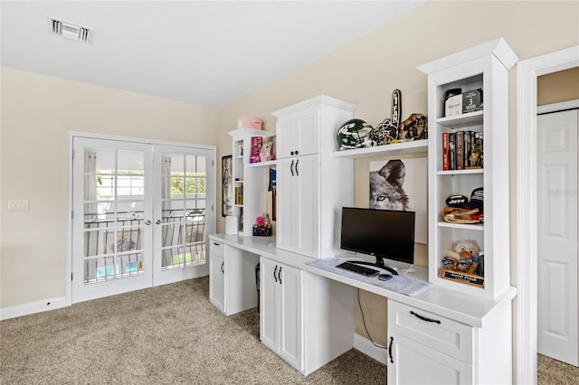 8424 Lake Burden Cir, Windermere, FL 34786 - office space with light colored carpet, built in study area, and french doors