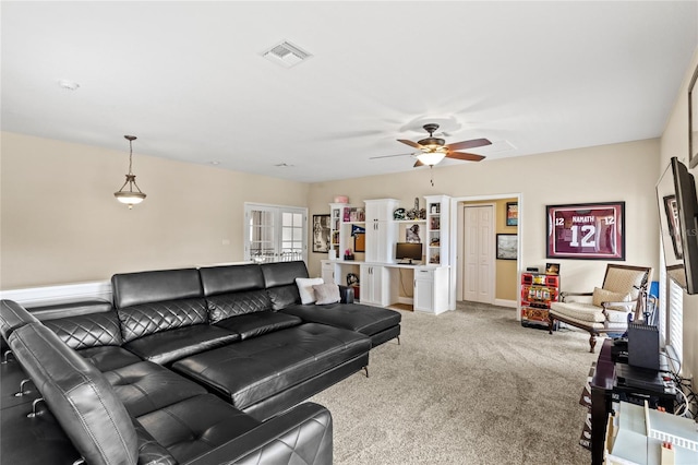 8424 Lake Burden Cir, Windermere, FL 34786 - living area with light carpet and ceiling fan