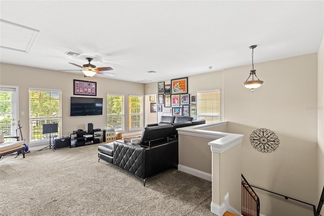 8424 Lake Burden Cir, Windermere, FL 34786 - living room featuring healthy amount of natural light, carpet flooring, and ceiling fan