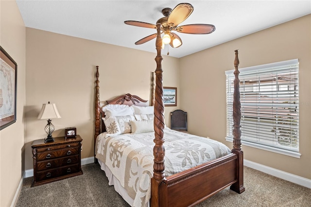 8424 Lake Burden Cir, Windermere, FL 34786 - carpeted bedroom featuring multiple windows and a ceiling fan