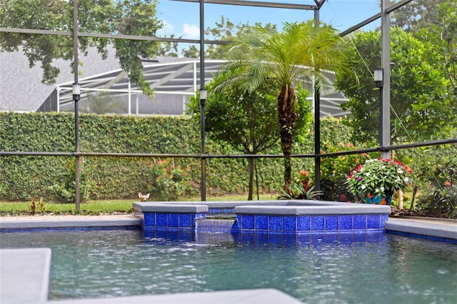 8424 Lake Burden Cir, Windermere, FL 34786 - view of swimming pool featuring a hot tub and a lanai