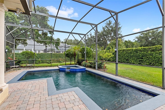 8424 Lake Burden Cir, Windermere, FL 34786 - view of swimming pool with a pool with connected hot tub, a patio area, and a yard
