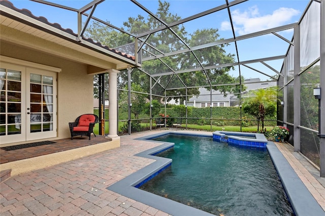 8424 Lake Burden Cir, Windermere, FL 34786 - view of swimming pool featuring french doors, a patio area, glass enclosure, and a pool with connected hot tub