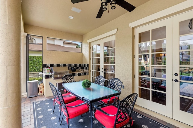 8424 Lake Burden Cir, Windermere, FL 34786 - view of patio featuring french doors, outdoor dining space, and grilling area