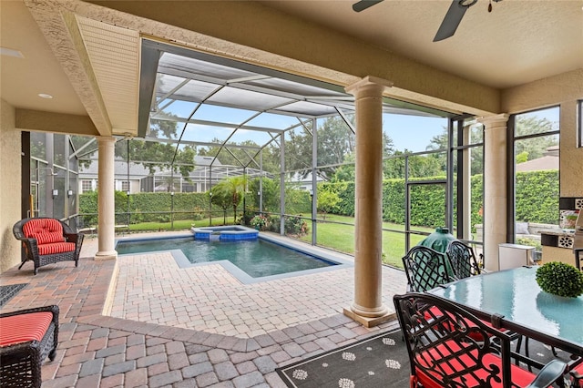 8424 Lake Burden Cir, Windermere, FL 34786 - view of swimming pool featuring ceiling fan, a patio area, outdoor dining space, a pool with connected hot tub, and a lanai
