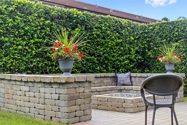 8424 Lake Burden Cir, Windermere, FL 34786 - view of patio / terrace featuring an outdoor fire pit