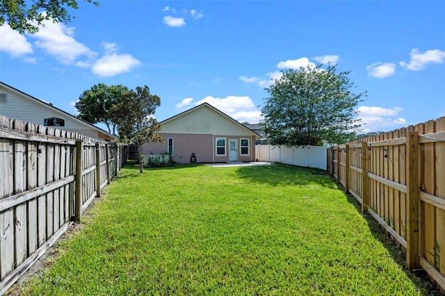 851 Bates Ct, Casselberry, FL 32707 - fenced backyard with a patio area