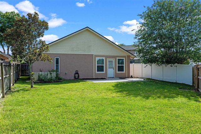851 Bates Ct, Casselberry, FL 32707 - back of property featuring a patio, a fenced backyard, and stucco siding