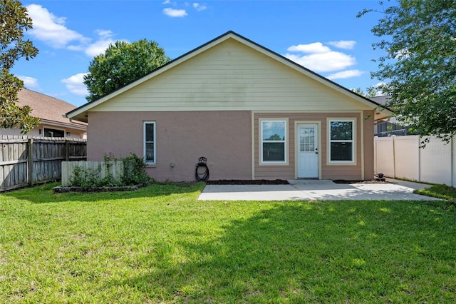 851 Bates Ct, Casselberry, FL 32707 - rear view of property with a patio area, stucco siding, and a fenced backyard