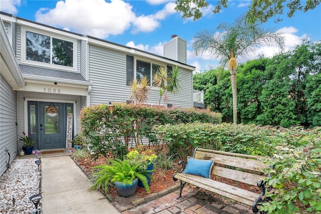 1035 Paladin Ct, Orlando, FL 32812 - entrance to property with a chimney