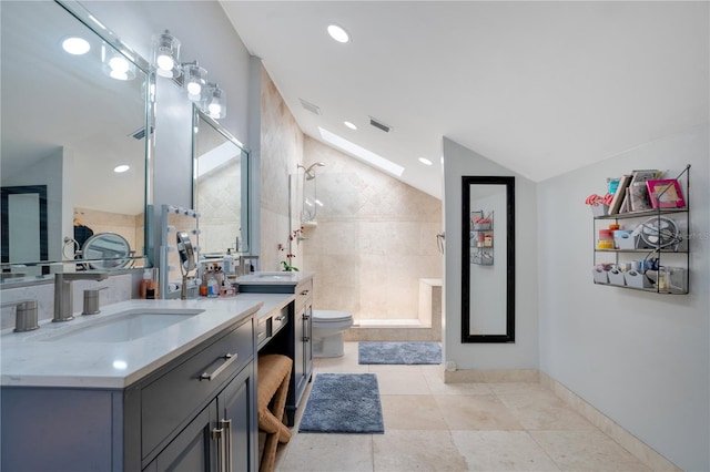 1035 Paladin Ct, Orlando, FL 32812 - bathroom featuring vanity, a tile shower, vaulted ceiling, tile patterned flooring, and recessed lighting