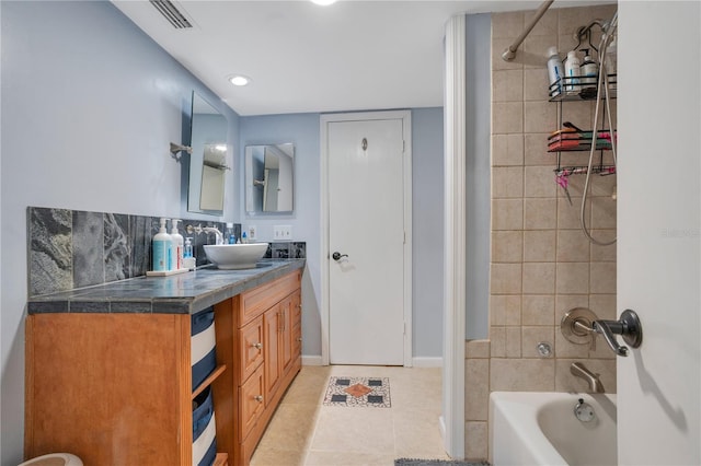 1035 Paladin Ct, Orlando, FL 32812 - bathroom featuring vanity, tile patterned flooring, bathing tub / shower combination, and recessed lighting