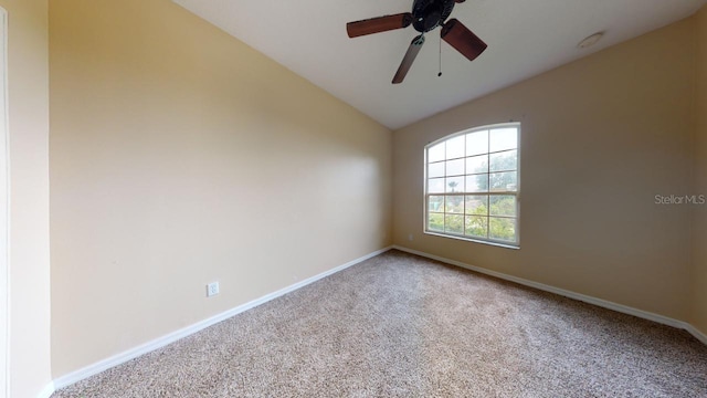 3552 Macauley Ct, Ocoee, FL 34761 - carpeted spare room featuring vaulted ceiling, ceiling fan, and a smoke detector