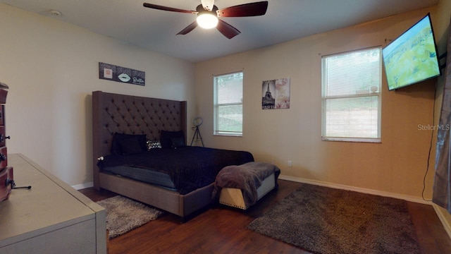 3552 Macauley Ct, Ocoee, FL 34761 - bedroom featuring dark wood finished floors and a ceiling fan