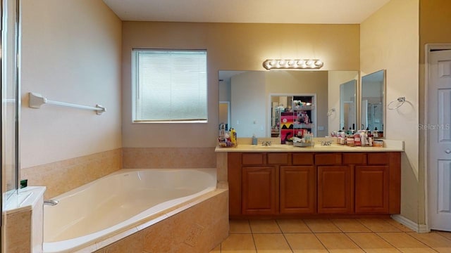 3552 Macauley Ct, Ocoee, FL 34761 - full bathroom with double vanity, a garden tub, and tile patterned floors