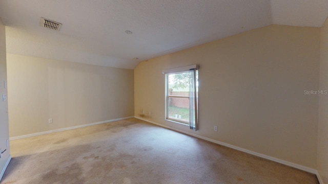 3552 Macauley Ct, Ocoee, FL 34761 - carpeted spare room featuring lofted ceiling