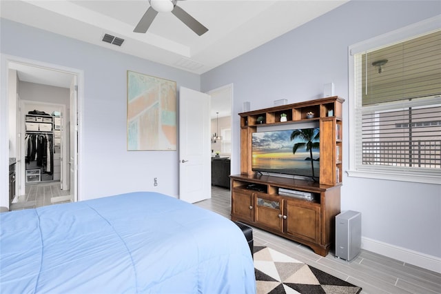 2302 Datura Loop, Saint Cloud, FL 34772 - bedroom with baseboards and ceiling fan