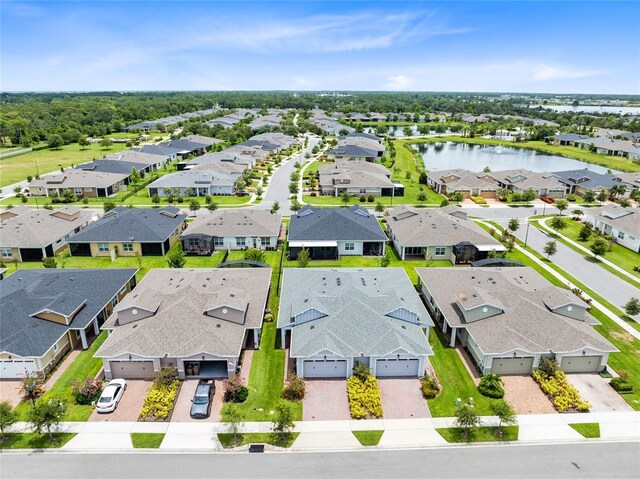 2302 Datura Loop, Saint Cloud, FL 34772 - aerial perspective of suburban area featuring a large body of water