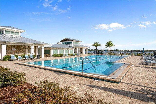 2302 Datura Loop, Saint Cloud, FL 34772 - community pool with a patio
