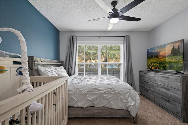 2035 Dixie Belle Dr Unit 2035C, Orlando, FL 32812 - bedroom with carpet, a textured ceiling, and a ceiling fan