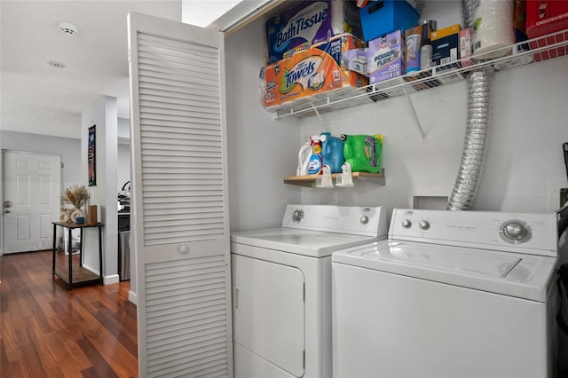 2035 Dixie Belle Dr Unit 2035C, Orlando, FL 32812 - laundry room with independent washer and dryer and dark wood-type flooring