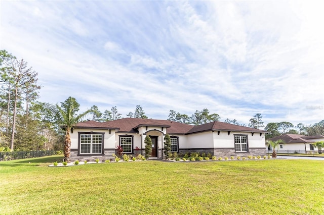 18623 Tunbridge St, Orlando, FL 32833 - view of front of property featuring stone siding and stucco siding