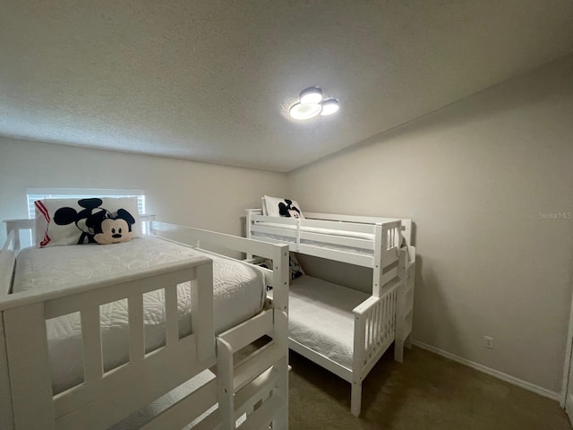 8071 Roaring Creek Ct, Kissimmee, FL 34747 - bedroom with carpet flooring and a textured ceiling