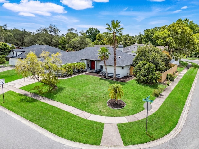 1173 Trotwood Blvd, Winter Springs, FL 32708 - view of front of home featuring a front yard, driveway, and roof with shingles
