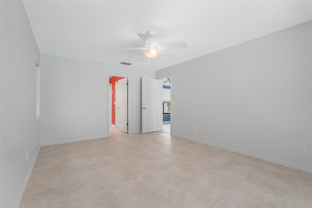 1173 Trotwood Blvd, Winter Springs, FL 32708 - spare room with ceiling fan and light tile patterned floors