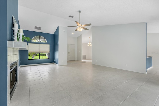 1173 Trotwood Blvd, Winter Springs, FL 32708 - unfurnished living room featuring ceiling fan, light tile patterned floors, a fireplace, a chandelier, and high vaulted ceiling