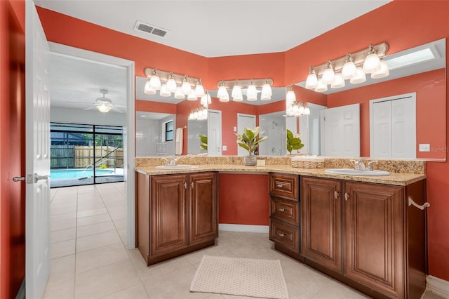 1173 Trotwood Blvd, Winter Springs, FL 32708 - bathroom featuring double vanity, tile patterned floors, and ceiling fan