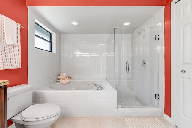 1173 Trotwood Blvd, Winter Springs, FL 32708 - bathroom featuring a garden tub, a shower stall, tile patterned floors, vanity, and recessed lighting