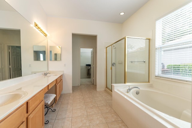 6631 Crestmont Glen Ln, Windermere, FL 34786 - full bath featuring a stall shower, double vanity, a garden tub, and tile patterned flooring