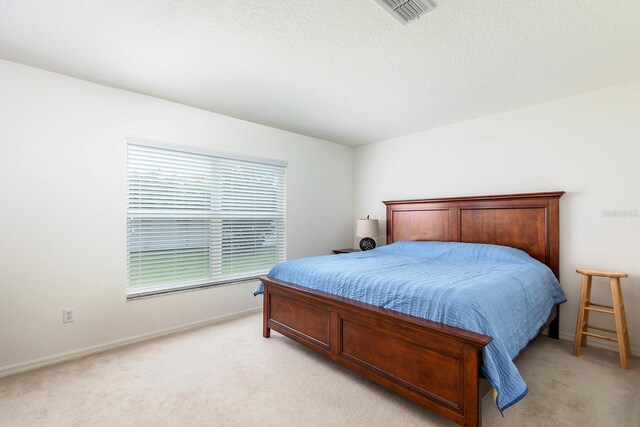 6631 Crestmont Glen Ln, Windermere, FL 34786 - bedroom with light carpet and baseboards