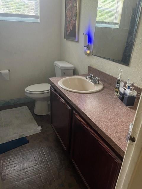 1807 N Powers Dr, Orlando, FL 32818 - bathroom featuring plenty of natural light and vanity