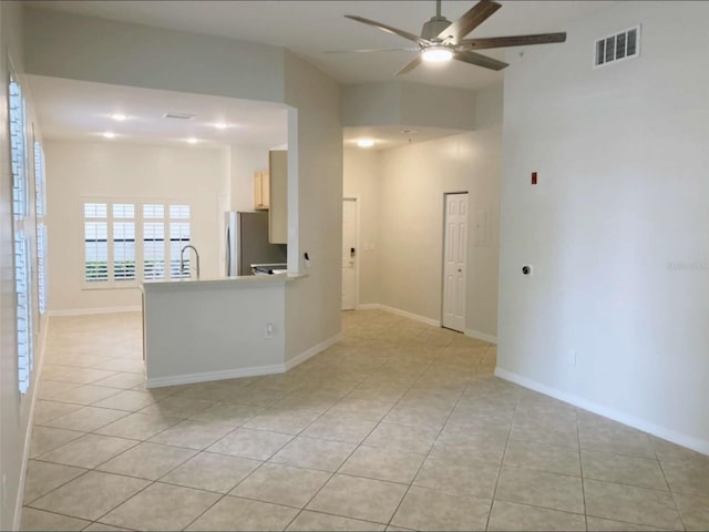 949 Westpark Dr Unit 107, Celebration, FL 34747 - empty room with a ceiling fan and light tile patterned floors
