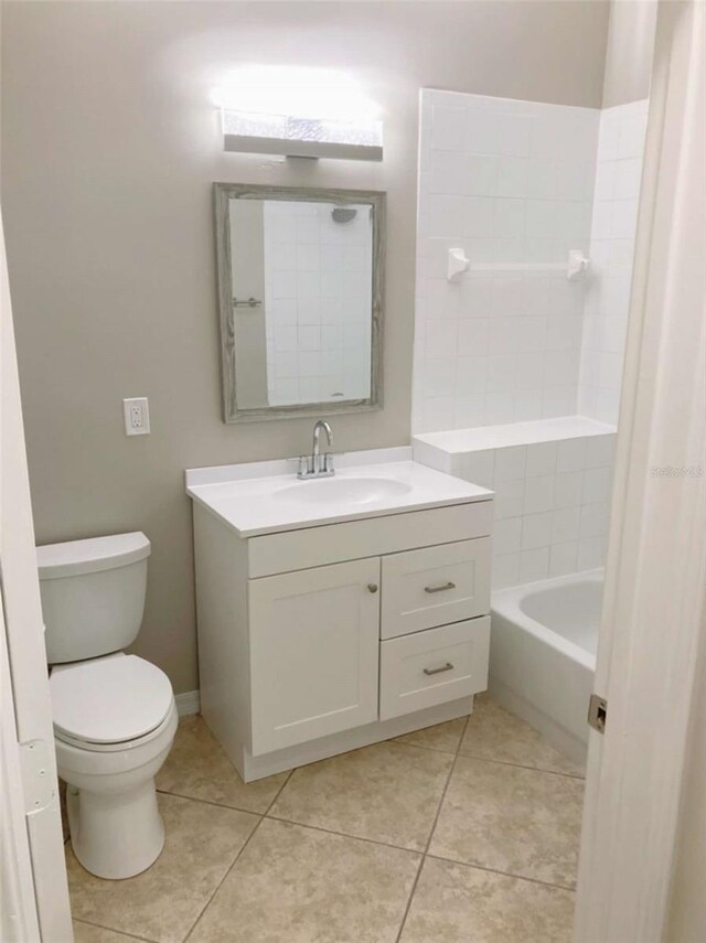 949 Westpark Dr Unit 107, Celebration, FL 34747 - full bathroom featuring vanity, tile patterned floors, and  shower combination