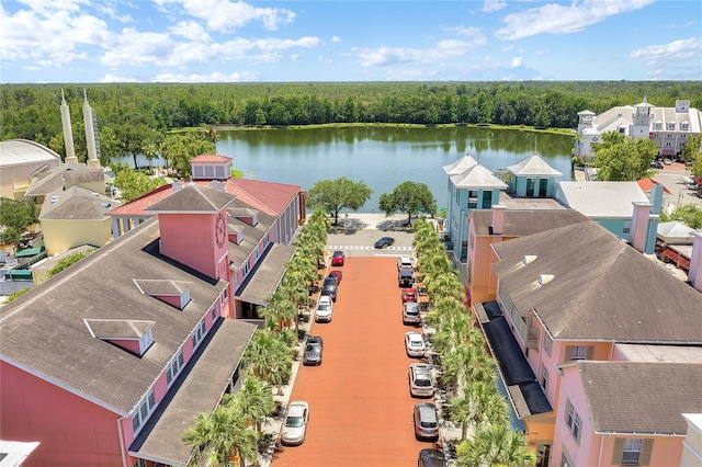 949 Westpark Dr Unit 107, Celebration, FL 34747 - drone / aerial view of a nearby body of water and a forest