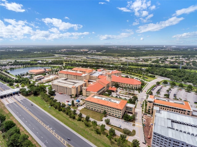 949 Westpark Dr Unit 107, Celebration, FL 34747 - drone / aerial view of a nearby body of water and a highway