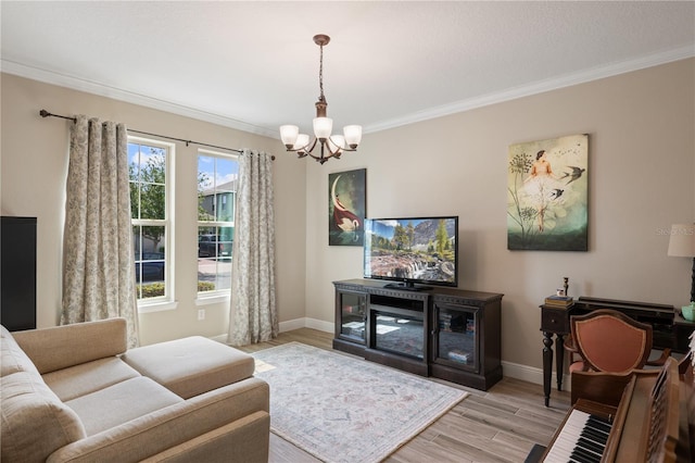 10180 Merrymeeting Bay Dr, Winter Garden, FL 34787 - living area featuring a chandelier, ornamental molding, and light wood-type flooring