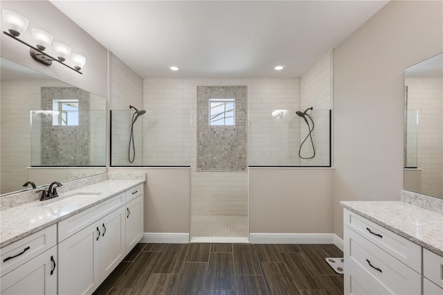 10180 Merrymeeting Bay Dr, Winter Garden, FL 34787 - full bath with vanity, walk in shower, wood finish floors, and recessed lighting