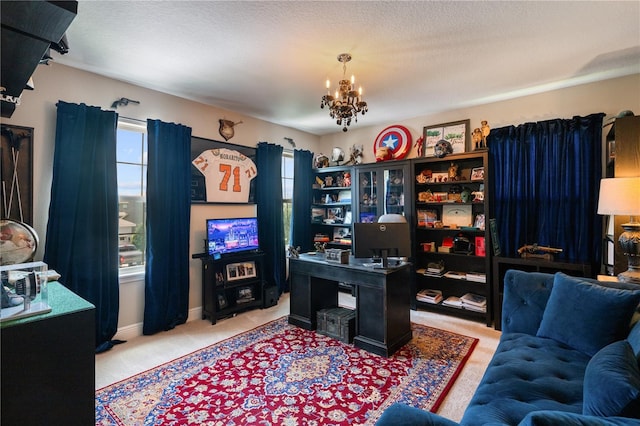 10180 Merrymeeting Bay Dr, Winter Garden, FL 34787 - office area with plenty of natural light, carpet flooring, a chandelier, and a textured ceiling