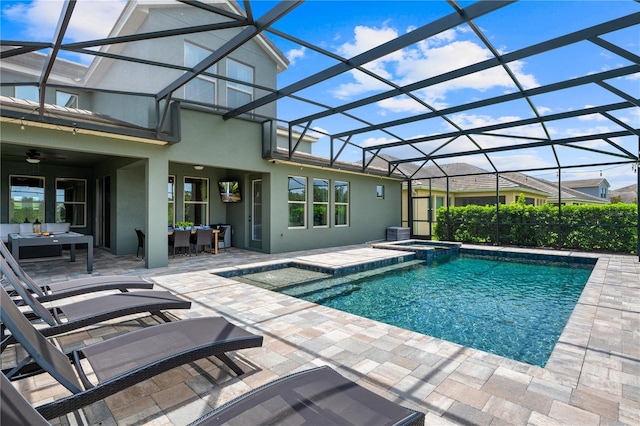 10180 Merrymeeting Bay Dr, Winter Garden, FL 34787 - view of pool with a patio, outdoor lounge area, ceiling fan, a pool with connected hot tub, and outdoor dining area