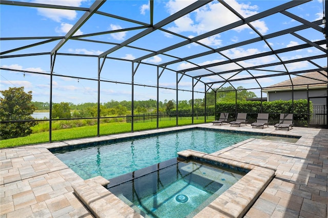 10180 Merrymeeting Bay Dr, Winter Garden, FL 34787 - view of swimming pool featuring a patio, glass enclosure, and a pool with connected hot tub