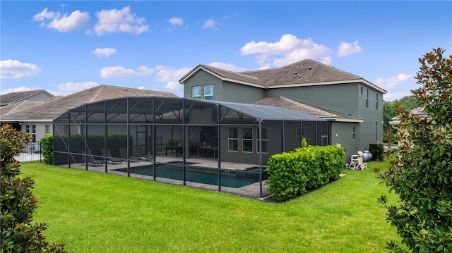 10180 Merrymeeting Bay Dr, Winter Garden, FL 34787 - rear view of house featuring stucco siding, a lawn, an outdoor pool, a patio area, and glass enclosure