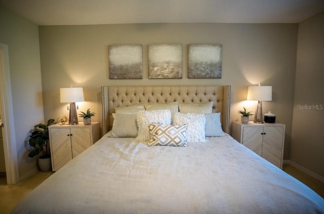 12105 Everglades Kite Rd, Weeki Wachee, FL 34614 - carpeted bedroom with baseboards