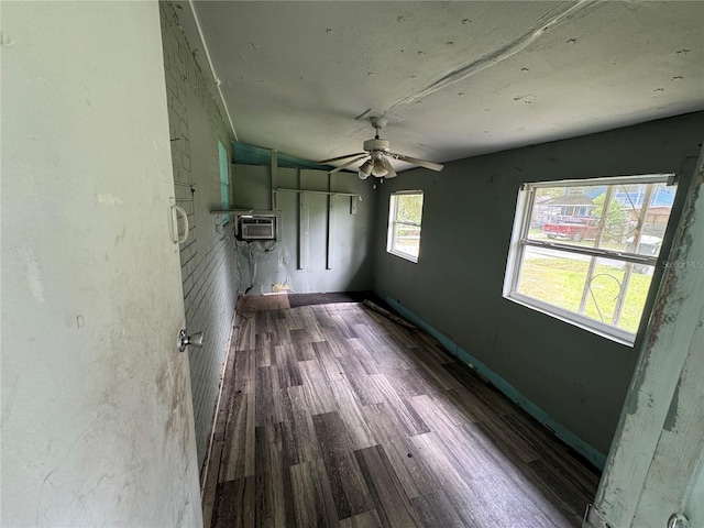 269 12th Ave, Ocoee, FL 34761 - empty room with ceiling fan, wood finished floors, and a wall mounted AC