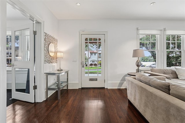 213 Phillips Pl, Orlando, FL 32806 - foyer entrance featuring wood finished floors and recessed lighting